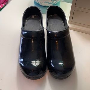 Dansko Black Patent clogs